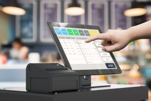 human hand working with 3d rendering cashier machine